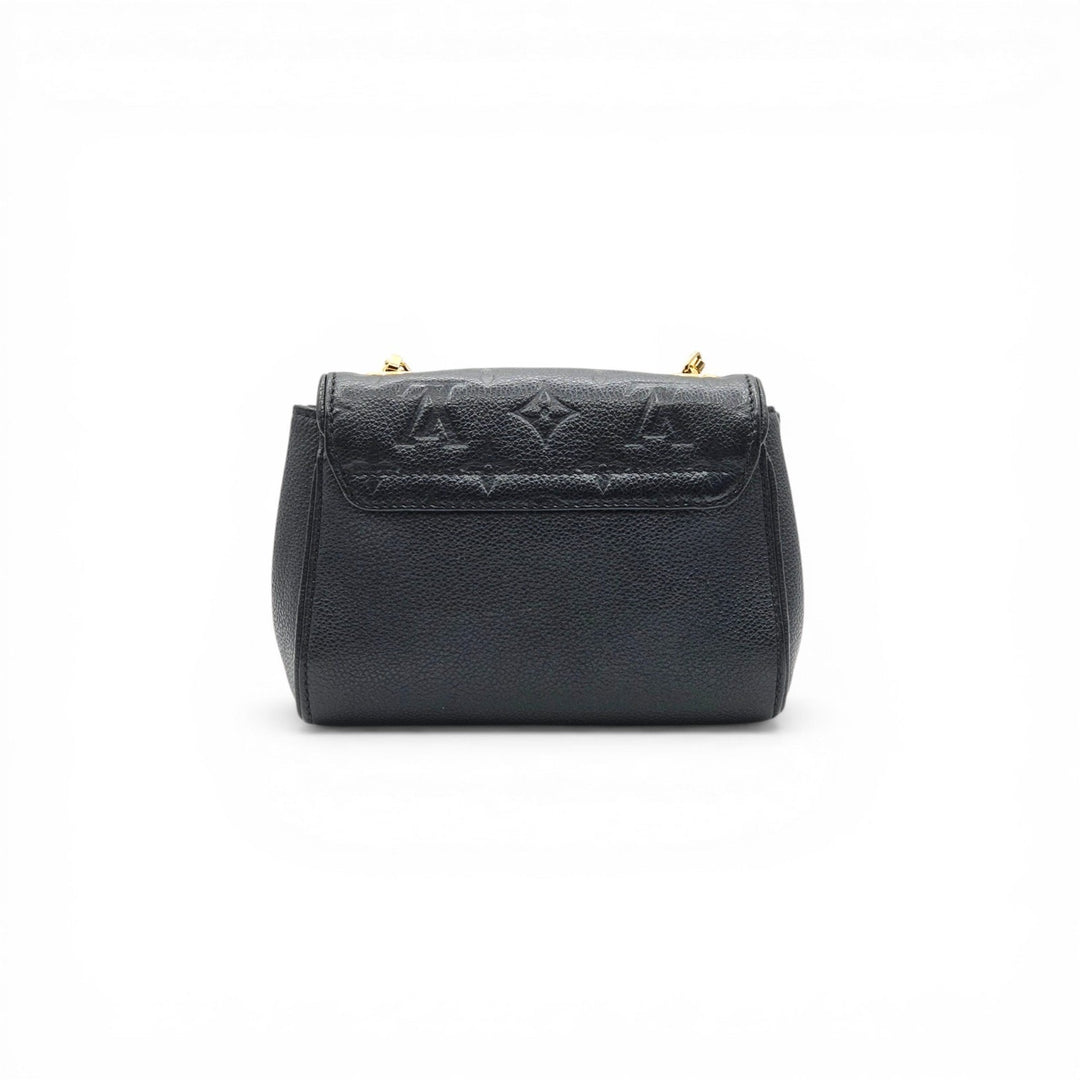Louis Vuitton Saint Germain BB Monogram Empreinte Leather Shoulder Bag in Black