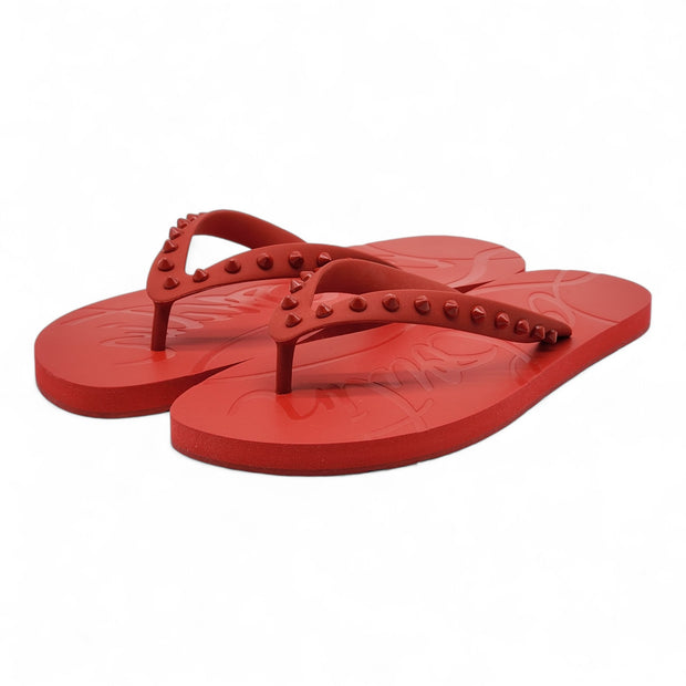 Christian Louboutin Loubi Flip Studded Flip Flops in Red